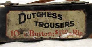 RARE ANTIQUE DUCTCHESS TROUSERS TICKET TAPE 10C 1 DOLLAR A TEAR DISPENSER - ANTI